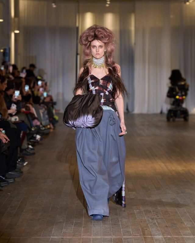HA-HMiaWIAUyiUA Collina Strada runway review, Hillary Taymour designer, NYFW Fall 2026 highlights, vampire runway theme, dark romance fashion trend, sustainable ready-to-wear, eco-conscious fashion brands, gothic fashion narrative, upcycled luxury materials, independent American designers, fashion storytelling 2026, ethical fashion leadership, New York Fashion Week analysis, fantastical fashion tale, modern gothic aesthetic, luxury sustainability movement, runway magazine fashion authority, future of ready-to-wear, editorial fashion critique, luxury fashion innovation