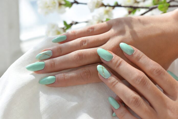 Mint Green Nails Are the Breakout Color Trend Dominating Spring Manicures Gen Z Slick Back Ponytail Are Replacing Mermaid Waves