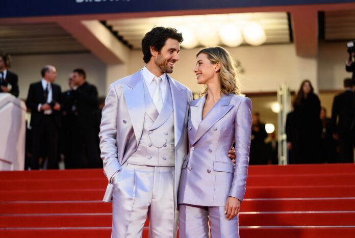 Barbara Palvin — Cannes 2026 Pregnancy Reveal in Miu Miu Barbara Palvin Sprouse in a Miu Miu gown with Dylan Sprouse in a double-breasted suit on the Cannes 2026 red carpet at the Parallel Tales premiere where they announced their first pregnancy.