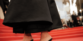 The Heeled Flip-Flop Has Officially Arrived at Cannes — and It’s the Shoe Trend of Summer 2026 Alaïa heeled flip-flop sandals worn with a drop-waist little black dress on the Cannes Film Festival 2026 red carpet — confirming the heeled thong sandal as the shoe trend of summer 2026.