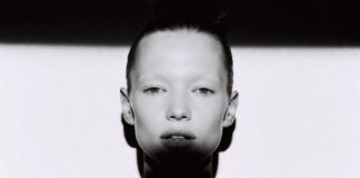 Editorial black-and-white portrait evoking 1990s supermodel fashion photography representing the rumored Kate Moss Netflix documentary and the cultural legacy of her Calvin Klein campaigns