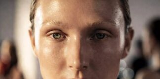 The No-Makeup Makeup Look: Runway Origins & How to Recreate Model with luminous no-makeup makeup look showing natural skin texture and barely there coverage, representing Runway Magazine's guide to the no-makeup makeup look's runway origins and step-by-step recreation