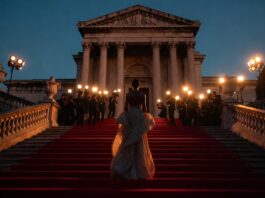 Oscars Best Dressed: Every Winner Since 2000 A figure in a sculptural designer gown on the Oscars red carpet representing Runway Magazine's complete Oscars best dressed archive from 2000 to 2026