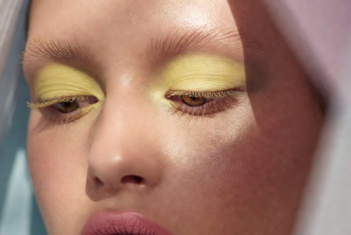 Butter Yellow Makeup Trend Summer 2026 Butter yellow makeup look featuring soft pastel eye makeup inspired by runway beauty trends