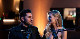 Celebrity Relationship Confessions Are Fueling a New Wave of Honest Conversations About Love Elegant podcast interview scene featuring a stylish couple seated before studio microphones in a luxury recording space with warm cinematic lighting and intimate conversation atmosphere.