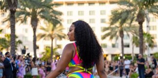 Megan Thee Stallion’s Hot Girl Summer Runway Becomes Miami Swim Week’s Biggest Viral Moment Confident figure in swirl-print one-piece swimsuit mid-stride on a Miami runway representing Megan Thee Stallion swimwear Hot Girl Summer Swimwear PARAISO Miami Swim Week 2026 runway show and viral fashion moment