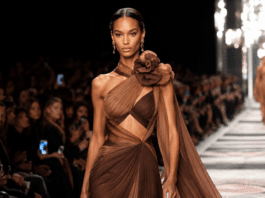 Mona Tougaard Continues Her Reign as One of Luxury Fashion’s Most In-Demand Runway Models A high fashion model walking a luxury runway show in an elegant designer look under bright runway lighting