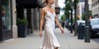 Why Ballet Sneakers Are Becoming the Defining Street Style Shoe of Summer 2026 Woman wearing ballet sneakers in a street style 2026 setting representing the sneakerina trend combining ballet flat elegance with sneaker comfort as worn by celebrities in NYC street style and fashion week street style including Adidas ballet sneakers Puma ballet sneakers and Louis Vuitton sneakerina.