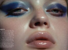 Bold Eyes, Juicy Lips, and Cellness Are Defining Beauty’s Next Big Era Editorial beauty close-up featuring bold blue eyeshadow and juicy blurred lips against luminous skin representing the beauty trends 2026 moment including cellness skincare glow bold makeup trend blue eyeshadow trend and the departure from minimalist beauty aesthetics.