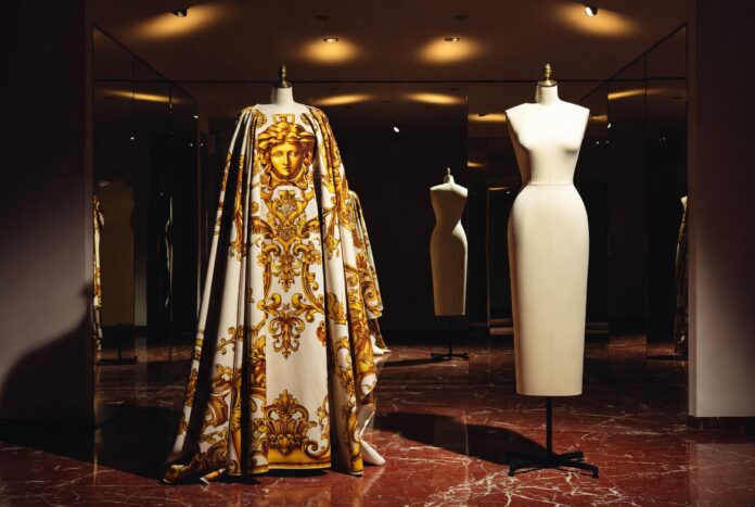 Two Versace looks representing Gianni vs Donatella Versace design philosophy comparison covered in Runway Magazine's complete guide to both creative eras