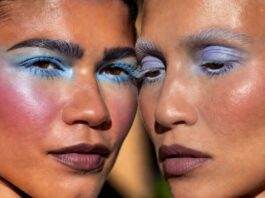 Icy Blue Eyeshadow Is Summer 2026’s New Celebrity Trend Model wears sheer icy blue and lavender eyeshadow with warm bronzed skin and a glossy neutral lip