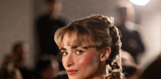 Romantic braided pigtails with soft glam makeup in a Paris couture beauty setting