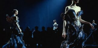 Schiaparelli Fall 2026 Couture Opened Paris With Surrealist Force Surrealist couture runway scene with marine-inspired gowns and dramatic Paris lighting